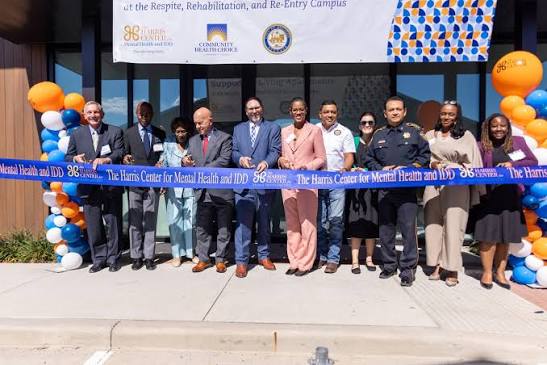 The Harris Center team and community leaders at a ribbon-cutting ceremony